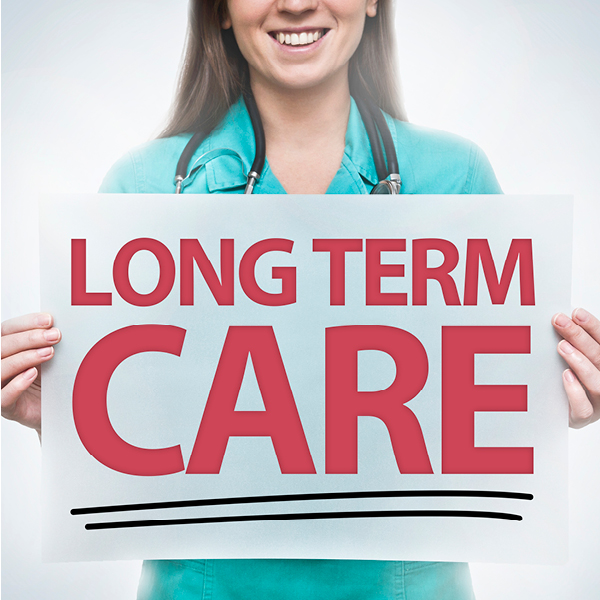 Nurse holding a Long Term Care sign